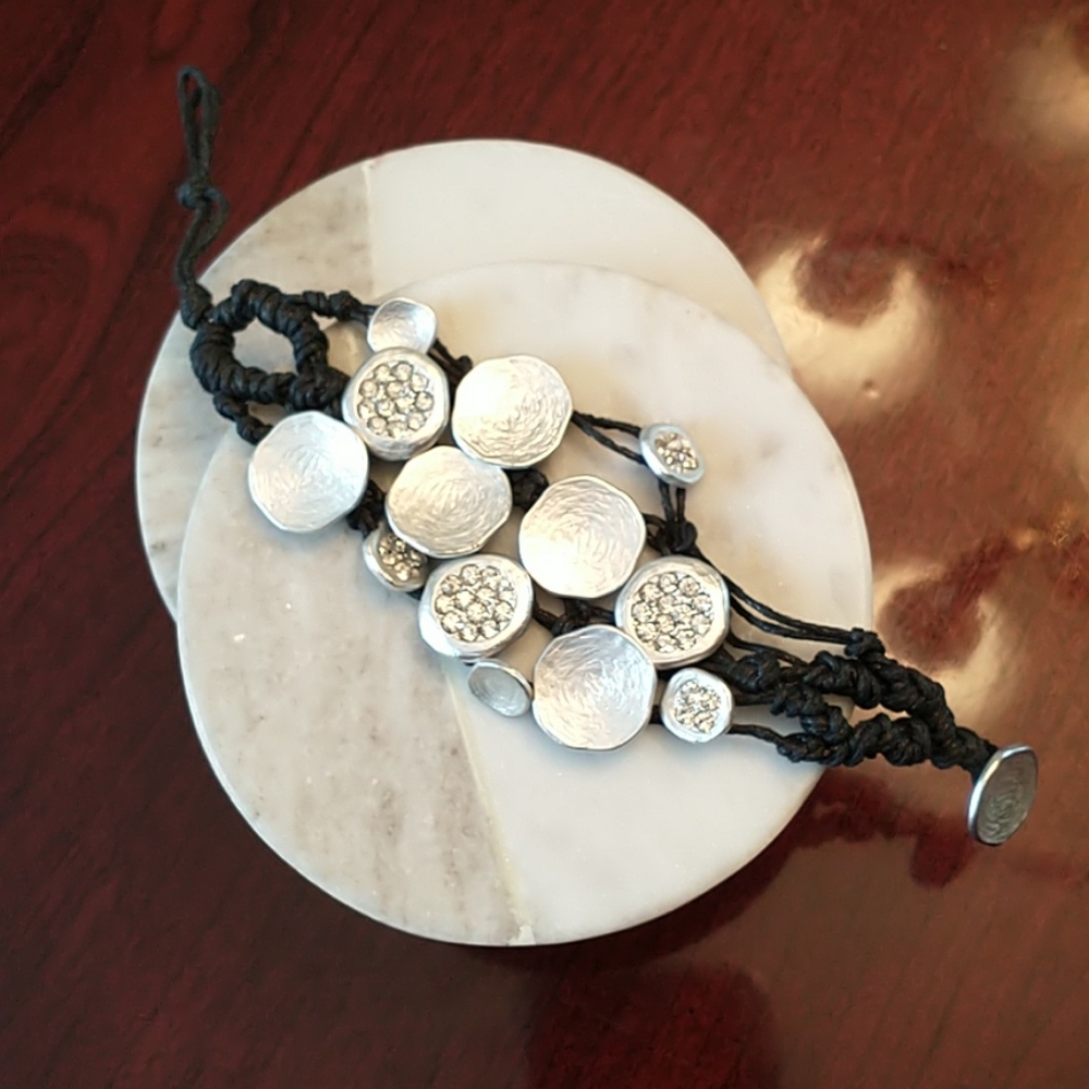 Silver tone string bracelet